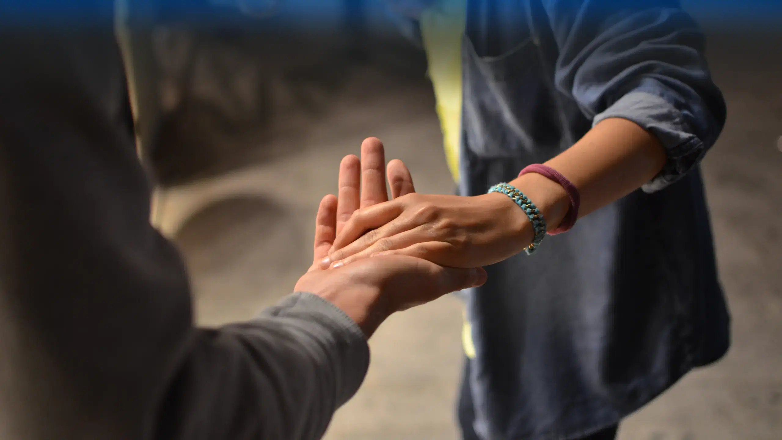 Hero image, hands holding with support